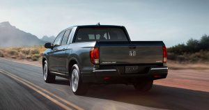 Dark Gray 2019 Honda Ridgeline on the highway. | Honda Dealer in San Antonio, TX