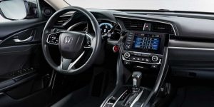Dashboard of the inside of a 2019 Honda Civic with black interior. | Honda dealer in San Antonio, TX