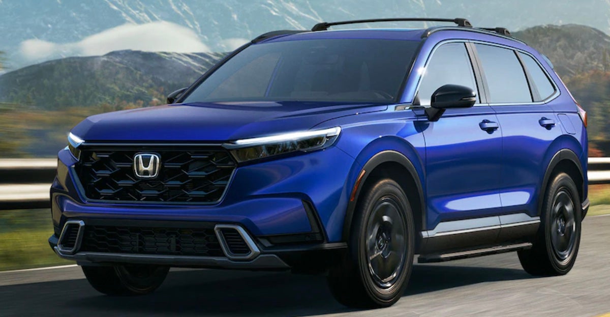 Blue 2023 Honda CR-V Hybrid driving