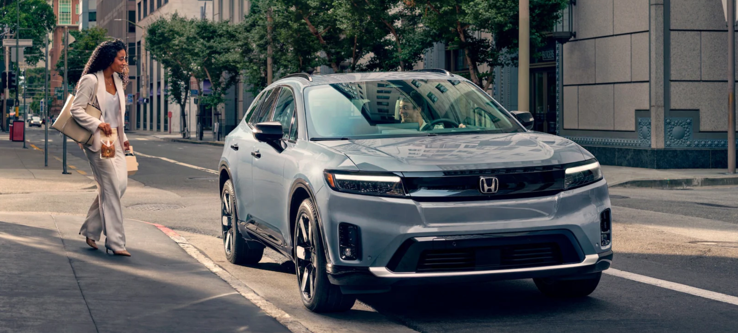 Woman Walking to the 2025 Honda Prologue