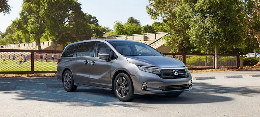 2022 Honda Odyssey Silver Metallic Parked Outside of Soccer Game